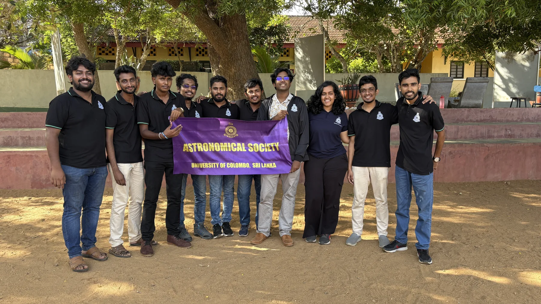 Astronomy society members gathered at a university camp