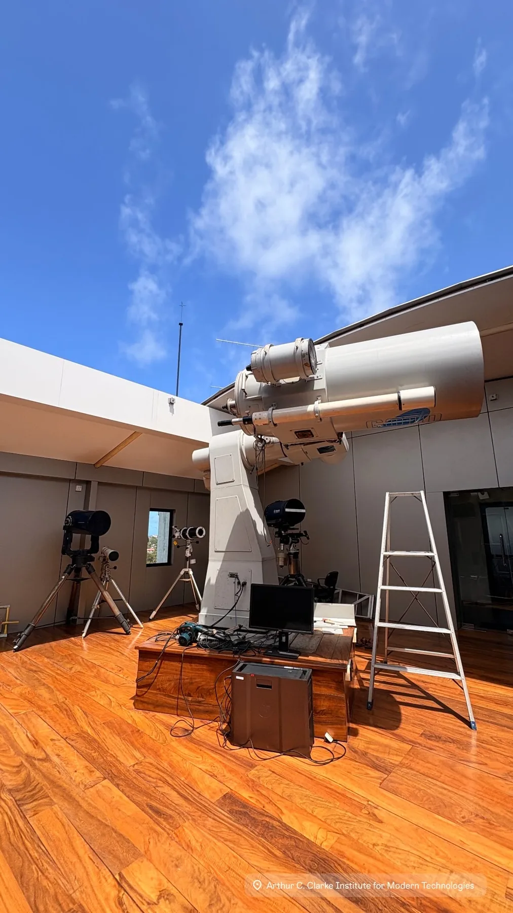 A solar observing instrument mounted on an observatory terrace