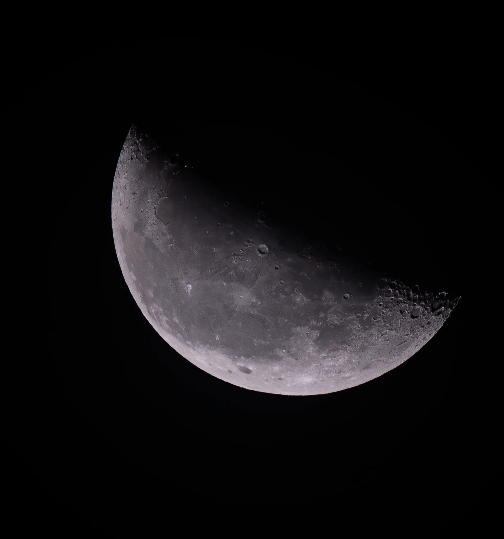 Crescent Moon with crater detail along the lunar terminator